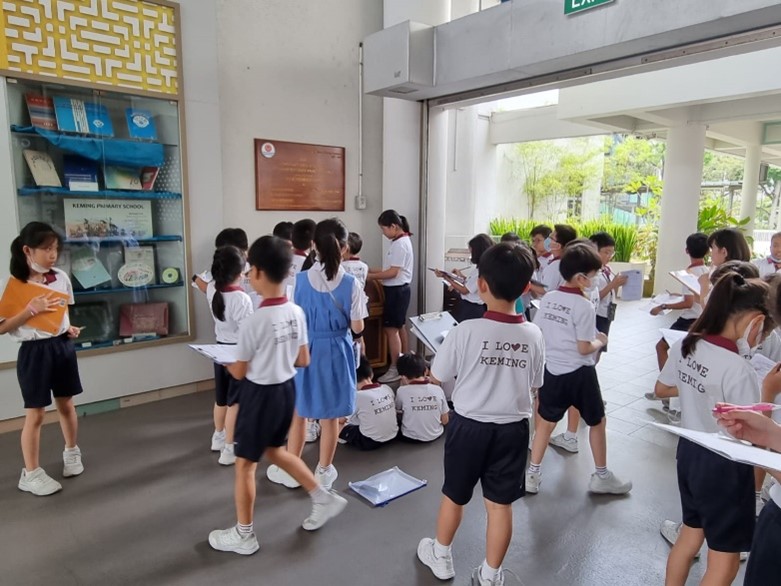 P3 Whole Numbers Addition & Subtraction: Students engaged in learning during the Maths Trail.